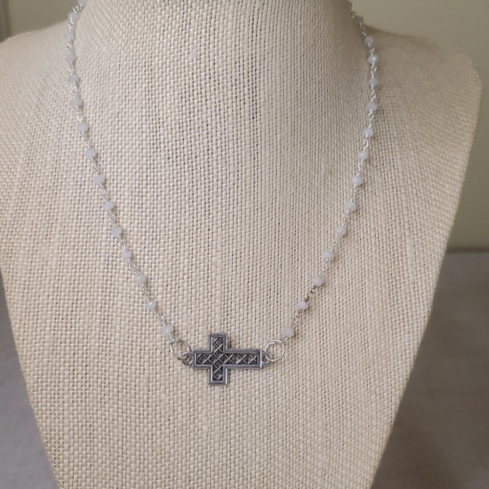 Silver and white beaded necklace with Cross charm.